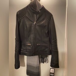 Black Label genuine leather jacket. New with tags.  Never worn. Zipper feature